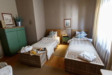 Фото номера Двухместный номер с 2 отдельными кроватями Гостевой дом Ratiu House г. Турда 3