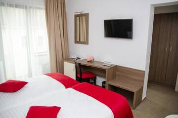 Фото номера Стандартный двухместный номер с 2 отдельными кроватями Отель Potaissa Hotel г. Турда 4